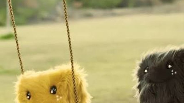 Sunny and Dusty on swings